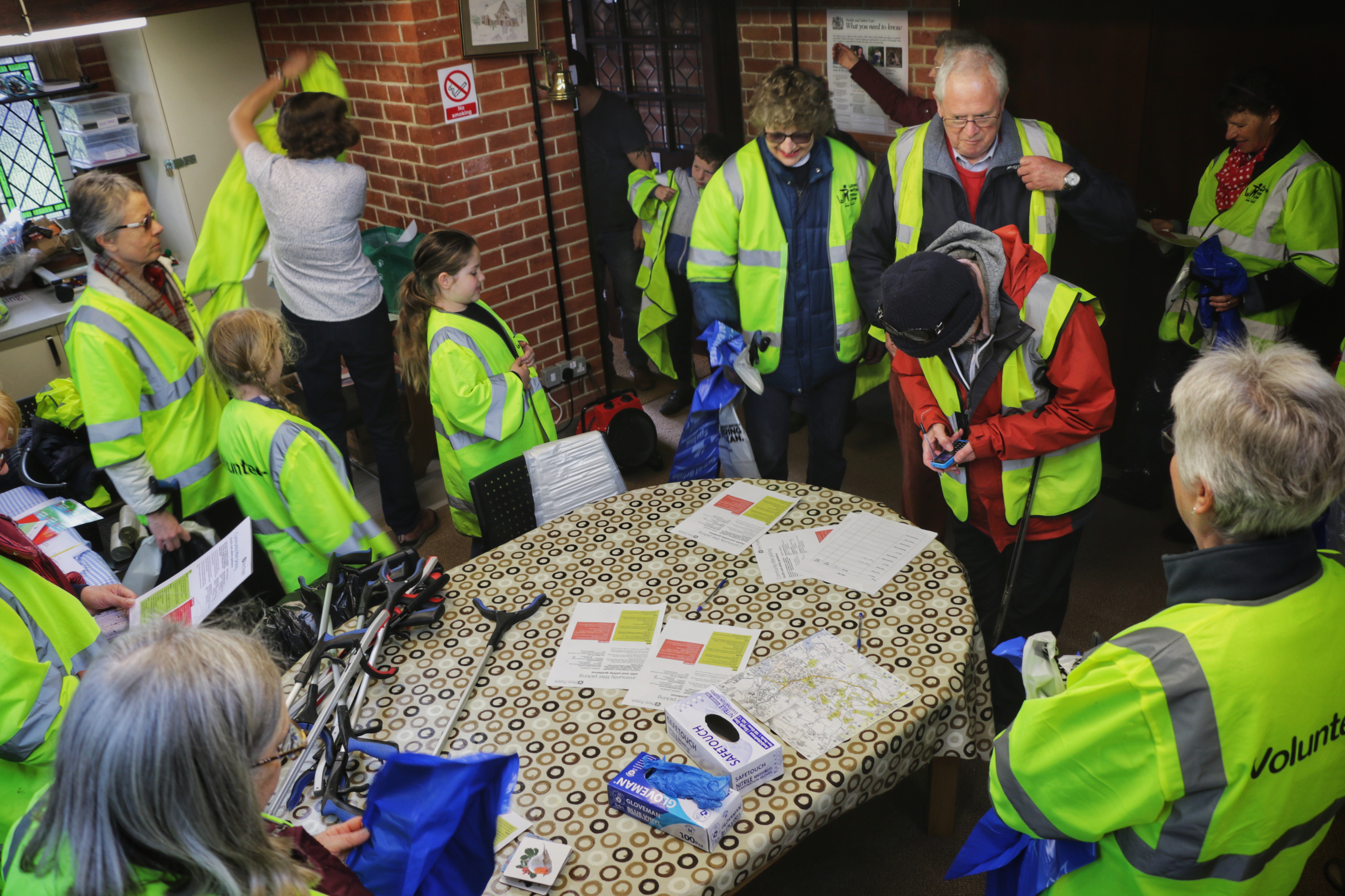 Volunteers prepare to tackle Pennington's litter at mission control: the St Mark's room