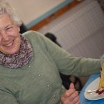 Ingrid enjoying desert at Harvest Festival 2018