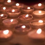 Candles lit during All Souls service