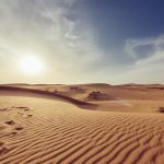 Desert sand with footprints