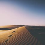 Footsteps in the sand dune