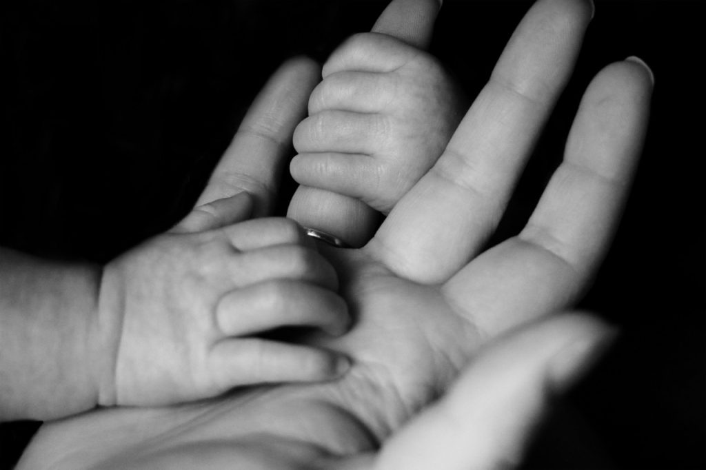 Mother and child hands